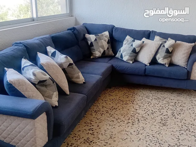 Contemporary furniture looking for a new home. Blue is a relaxing color and compliments most color
