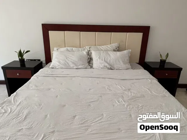 King size bed + 2 bedside tables