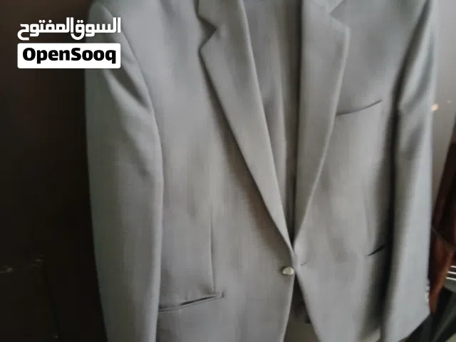 بدلة رجالي رسمية – لون رمادي أنيق ماركة Dark Line المقاس: 52 الحالة: جديدة وغير ملبوسة