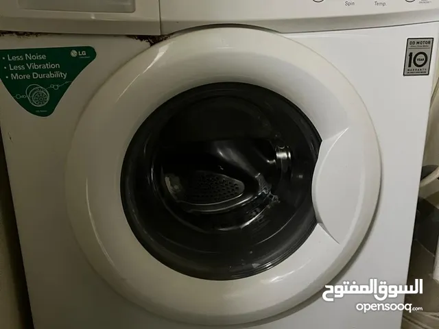 غسالة إل جي أوتوماتيكية تحميل أمامي بسعة 7 كغم – محرك الدفع المباشر، متعددة البرامج، بيضاء اللون