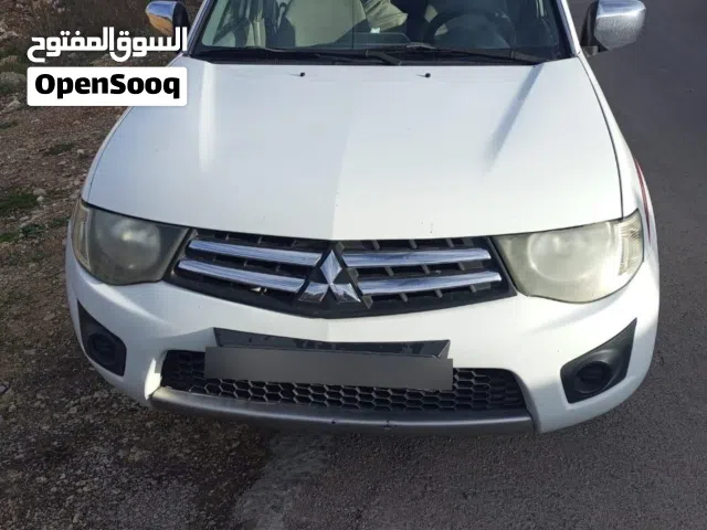 بيك أب ميتسوبيشي L200 (تريتون) دبل كابينة للبيع - قوة واعتمادية للمهام الصعبة!