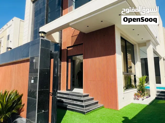 Spacious villa featuring 4 master bedrooms, a large hall, majlis, two kitchens with dining