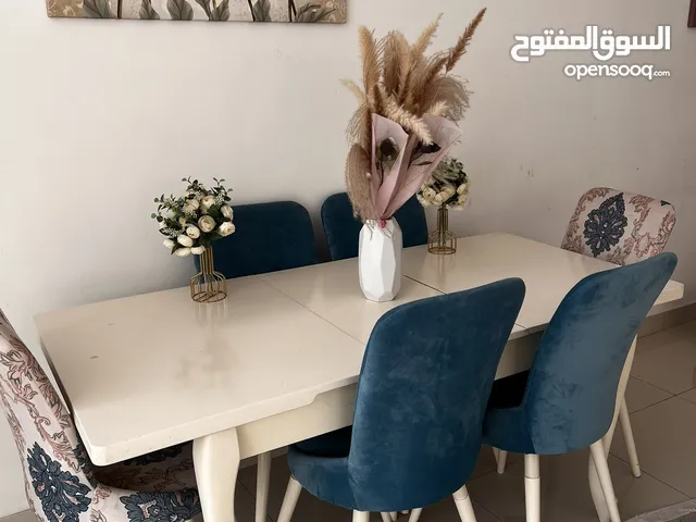 Extended dining table with 6 chairs