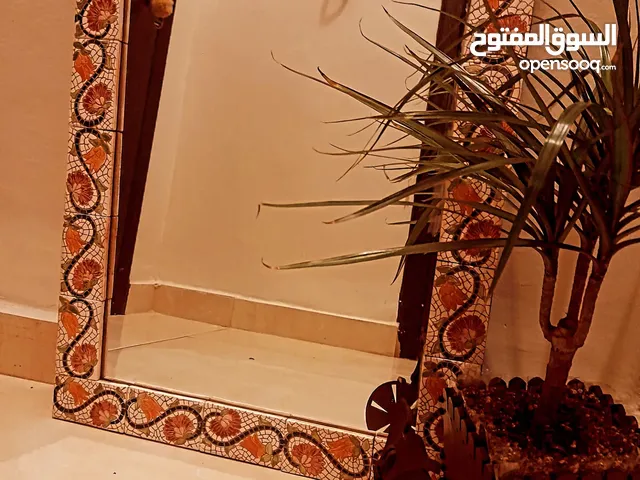 Mirror made of Clay مراي من فخار مزخرفة بالورد