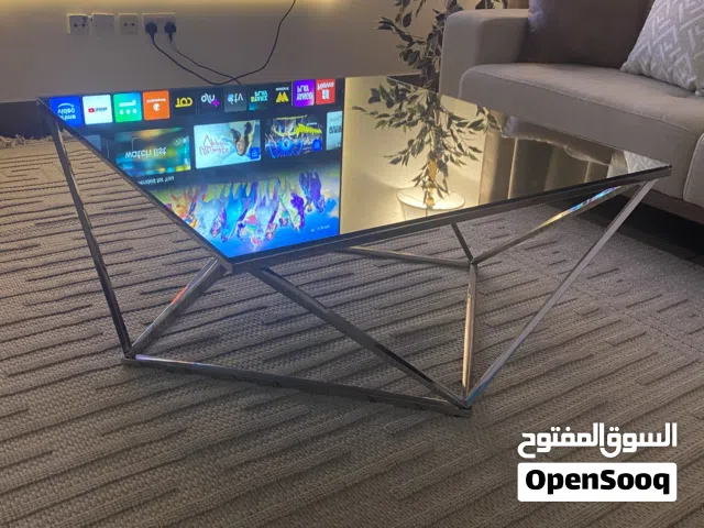 Coffee table elegant stainlessteel with antique glass