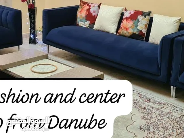 Sofa set with center table and cushions from Danube for 140 riyals