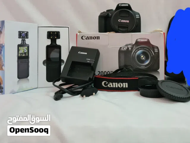 عرض قوي كاميرا كانون 2000D بملحقات الوكالة  + كاميرا فيديو بكرتونها  ب 105ر.ع