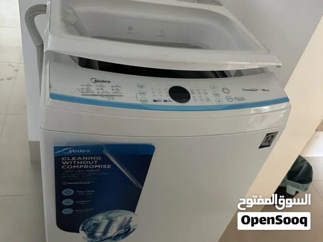غسالة ميديا 12 كيلو - نظيفة جداً (تحتاج صيانة بسيطة للتوازن)
