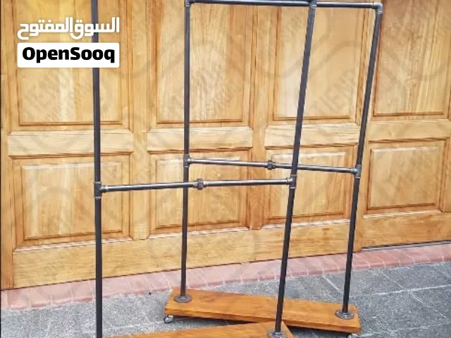 تفصيل ستاندات ملابس ورفوف ديكور