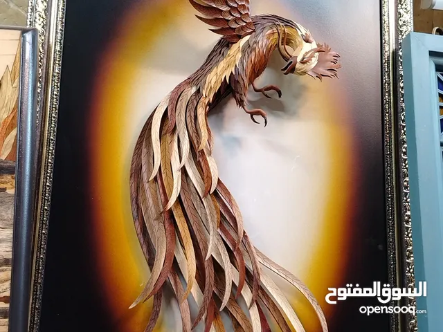 لوحة بارزة مع تطعيم فسيفسائي بتصميم سيمرغ الفن الإيراني