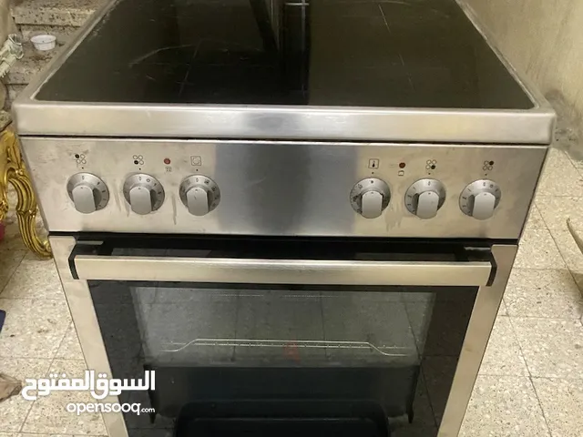 Electric cooker with oven