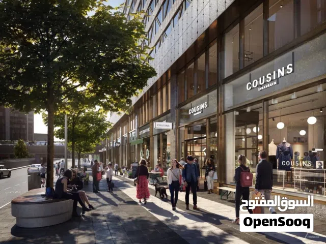 محلات تجاريه في بوليفارد راقي للبيع على الشارع العام مباشره