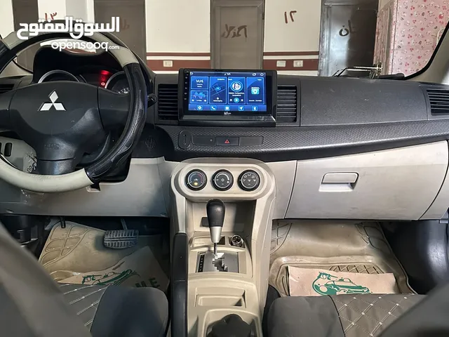 لانسر فراشة 2014 ex