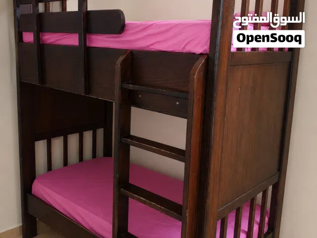 تخت طابقين لعمر من سنه ل8 سنوات خشب لاتيه 18ملبس قشر بلوط والحرف زان.