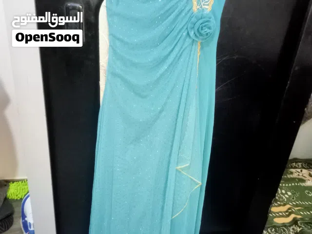 فستان سهرة لون اخضر فيروزي