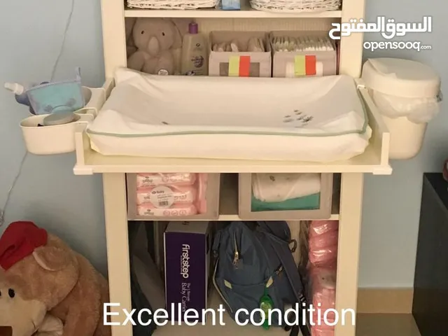 Ikea cabinet with changing Table (removable), changing mattress, cover, cups & diaper bin