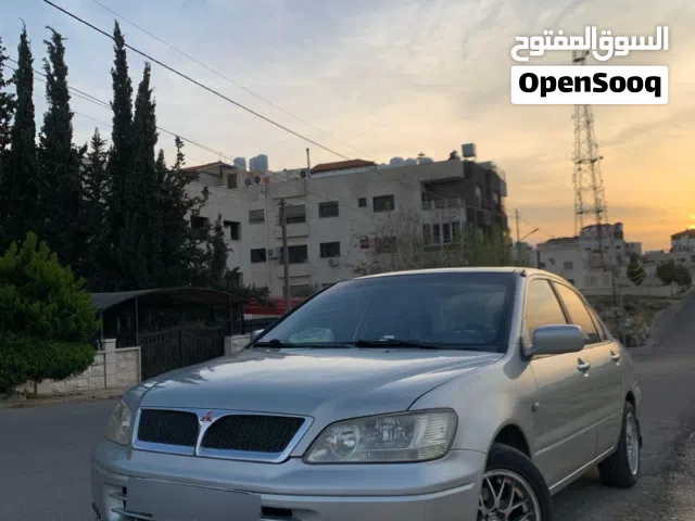 2002 ميتسوبيشي لانسر GLX
