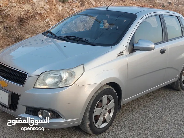 شيفروليه افيو 2009 هاتشباك فضي مستعملة بحالة ممتازة عداد 78000 كم حقيقي