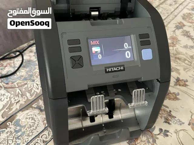 الة عد النقود وفرزها