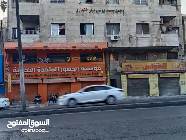 مجمع تجاري وسكني ب دخل 40 الف دينار سنوي