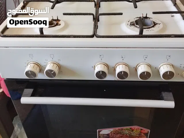 فرن غاز 4عيون مستعمل ممتاز ودرل شحن ممتاز للبيع 40دينار فقط
