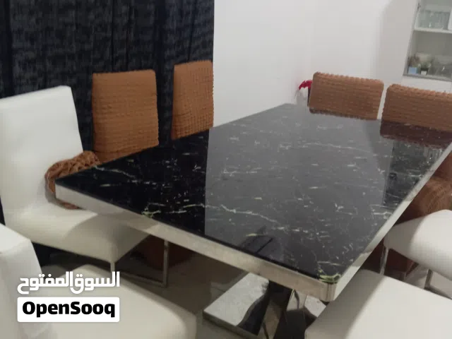 8-Seater Dining Table Set with Chairs – Good Condition AED 500