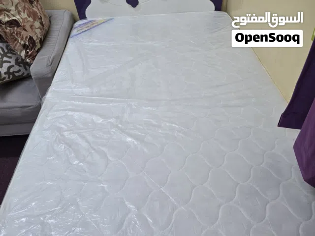 BED WITH NEW MATTRESS