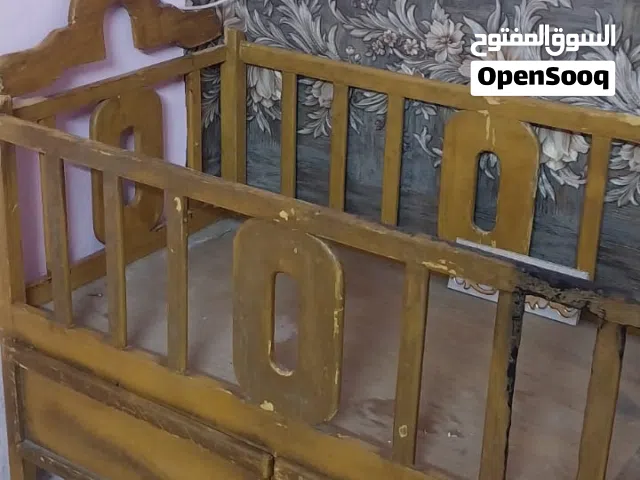 سرير طفل خشب