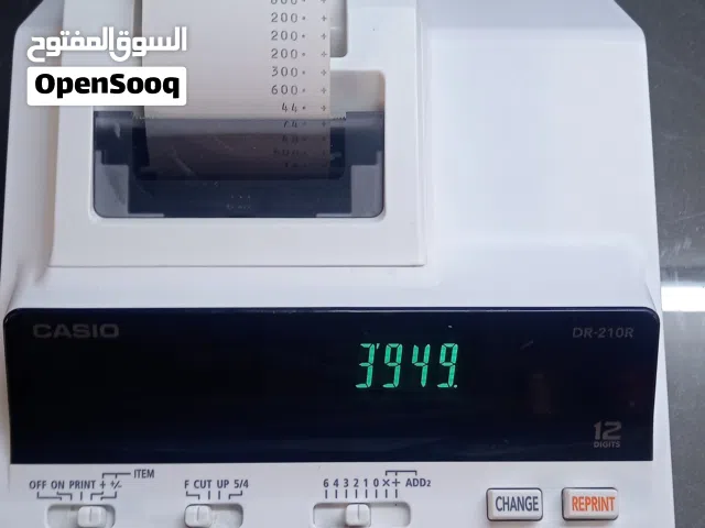 الة حاسبة رقمية مع طابعة مدمجة