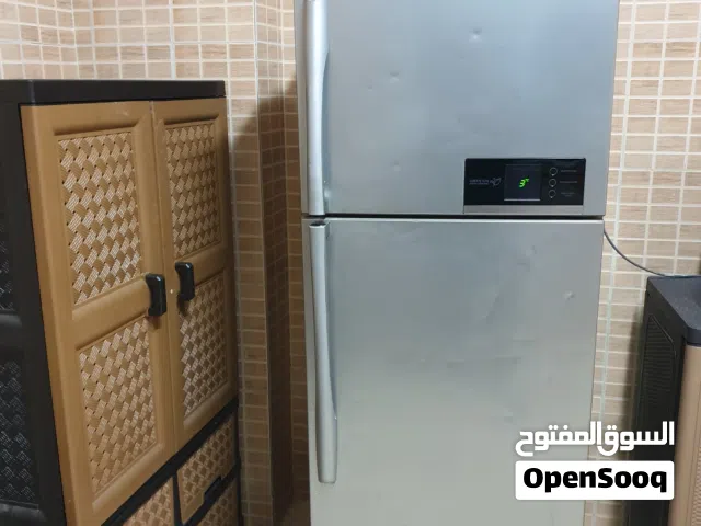 غسالة  و  ثلاجة ممتازه LG