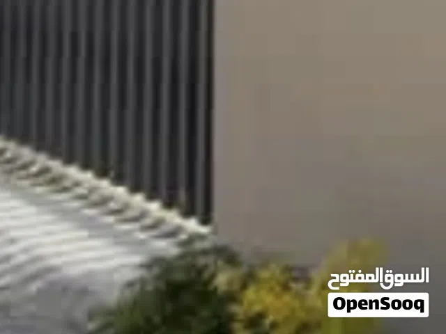قطعة ارض جنزور الشرقية قرب مستشفى المعاقين واجهة شرقية وقطران منظم