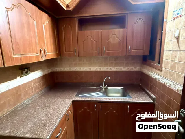 Studio unfurnished in Auzaiba near 18 November street behind shell oil