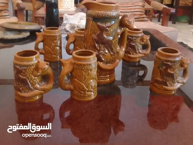 طقم كاسات فخار قديم للبيع بسعر ممتاز الطقم مكون من سبع قطع و حالتو ممتازة