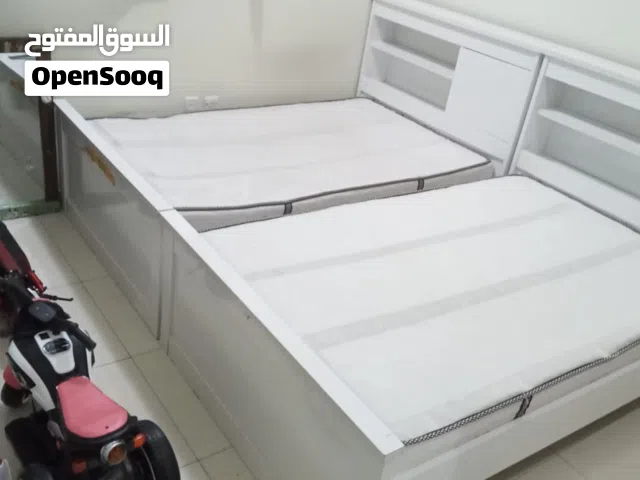 Two beds with mattress