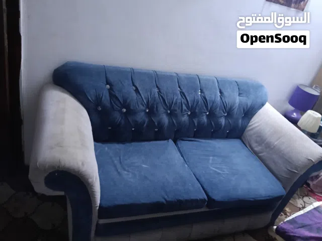 Two sofas for sale  Center table  Tv stand