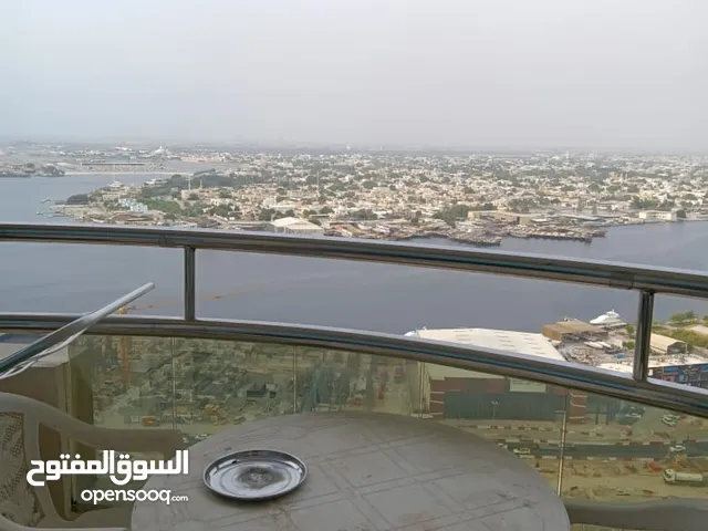 للبيع شقة غرفتين وصاله في ابراج الهرايزون عجمان الراشدية1 بجانب نستو ومباشر على لميناء