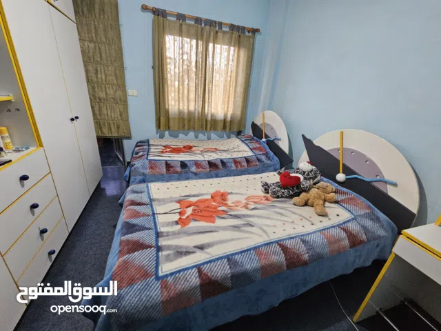 2 kids beds and one desk for sale