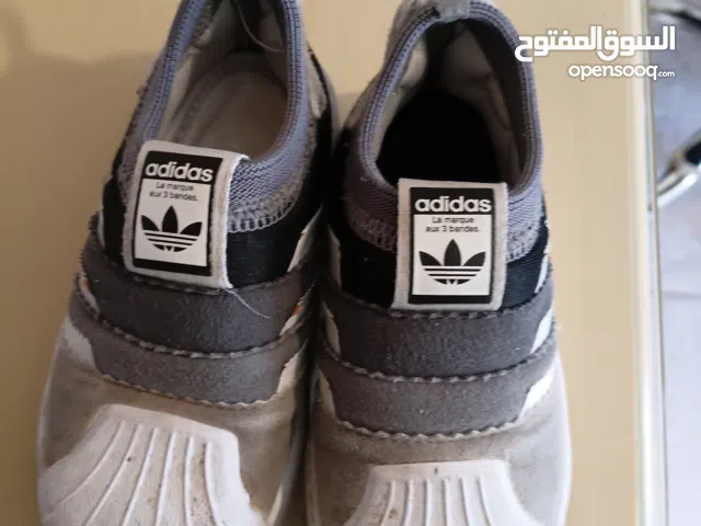 اديداس اصلي ابيضو سكني نمرة 23