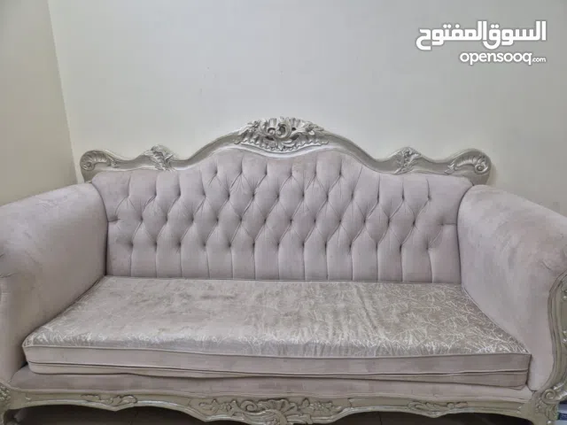 Selling two sofas white and grey