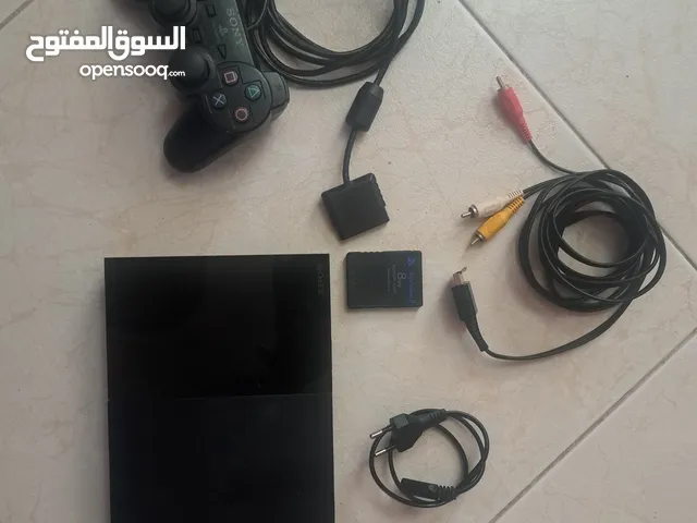 PlayStation 2 with one controller and one game