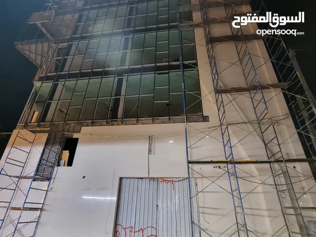 بناية 200 متر ركن للايجار طابقين في الحارثية قرب شارع الكندي