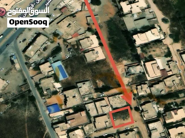 قطعة أرض 500 م واجهتين قريبة من الرئيسي