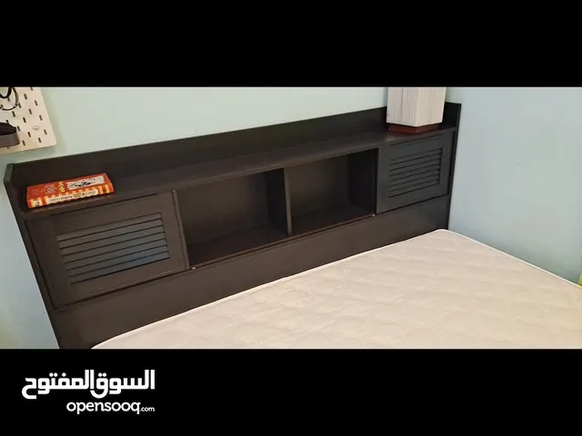 A queen size bed size 150×200 cm