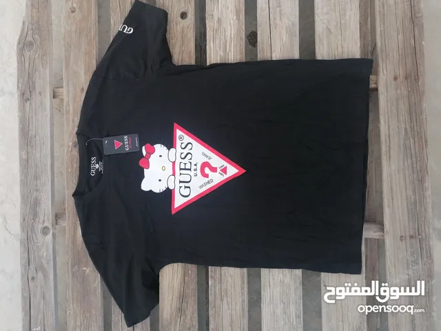 Hello kitty بلوزه من تعاون guess