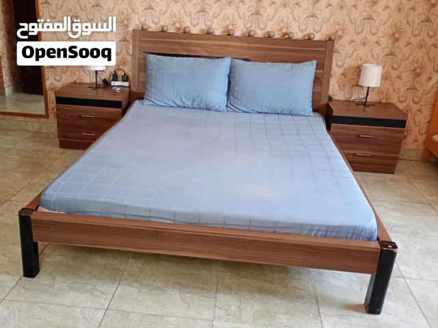 bed with mattress  and side tables