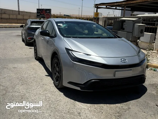 تويوتا بريوس هايبرد 2024 تصلح للعمومي   والاعفاءات (محرك 2000cc) غير مجمركة / المنطقة الحرة الزرقاء
