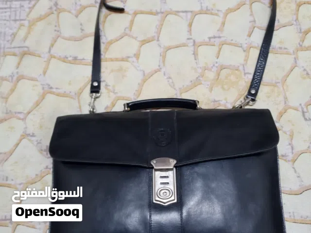 حقيبة وشنطة  THE ORIGINAL DISSER جلدية فاخرة وانيقة مصنوعة من الجلد الإيطالي  الأصلي الطبيعي .