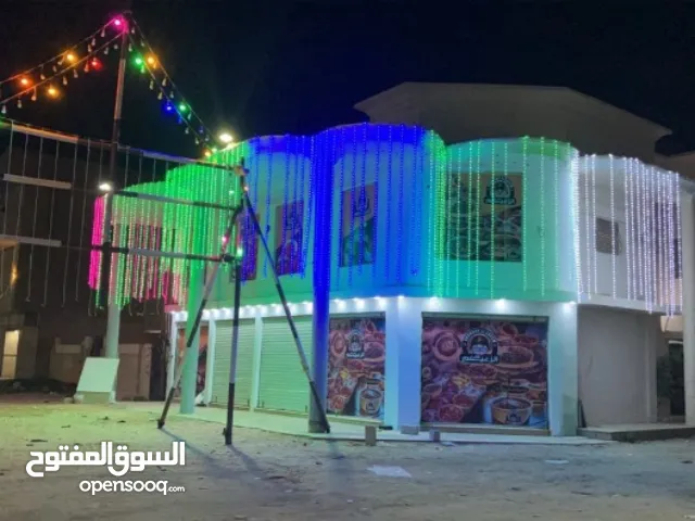 منزل على شارعين بواجهة محلات رئيسي شارع العراق