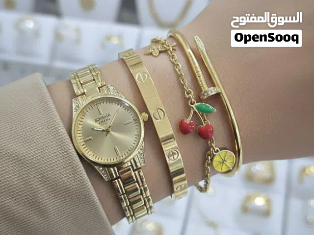 طقم ساعة وإسوارات ذهبية نسائية رائعة وأنيقة