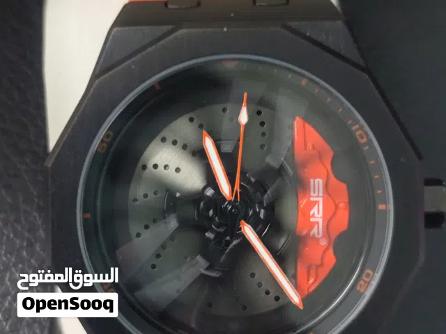 ساعة يد اللون البرتقالي